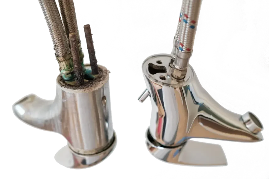 Photo of a faulty, corroded tap replaced with a new tap with new flexible hoses